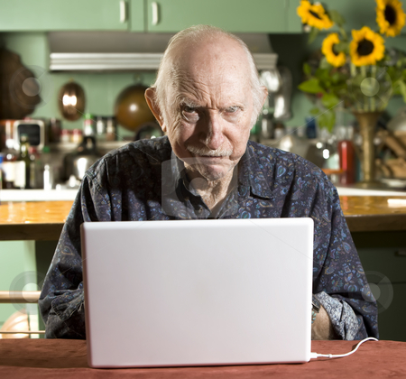cutcaster-photo-100092142-Grumpy-Senior-Man-with-a-Laptop-Computer.jpg